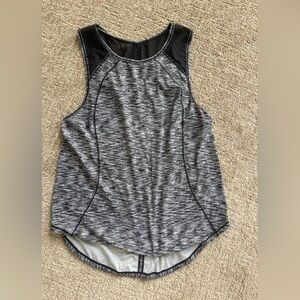 Lululemon ultra light tank with opening in the back.